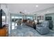 Living room with water views, comfy seating, and tiled floors at 8150 Brent St # 746, Port Richey, FL 34668