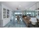 Bright living room with water views, built-ins, and tiled floors at 8150 Brent St # 746, Port Richey, FL 34668