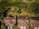 Aerial view of houses with brown roofs at 9609 Brookdale Dr, New Port Richey, FL 34655
