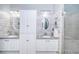 Elegant bathroom with double vanity and a large shower at 9609 Brookdale Dr, New Port Richey, FL 34655