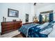 Bright bedroom with a king-size bed and ample natural light at 9609 Brookdale Dr, New Port Richey, FL 34655