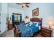 Spacious bedroom with a king-size bed, and access to a private patio at 9609 Brookdale Dr, New Port Richey, FL 34655