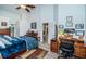 Comfortable bedroom with king-size bed and convenient workspace at 9609 Brookdale Dr, New Port Richey, FL 34655