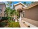 House entrance with walkway and landscaping at 9609 Brookdale Dr, New Port Richey, FL 34655