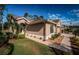 Tan house with walkway and landscaping at 9609 Brookdale Dr, New Port Richey, FL 34655