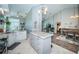 Open concept kitchen with large island, granite counters, and stainless steel appliances at 9609 Brookdale Dr, New Port Richey, FL 34655