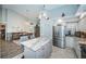 Modern kitchen with stainless steel appliances, granite counters, and an island at 9609 Brookdale Dr, New Port Richey, FL 34655