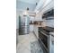 Updated kitchen with stainless steel appliances and granite countertops at 9609 Brookdale Dr, New Port Richey, FL 34655