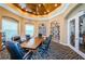 Community library with a large table and comfortable seating at 9609 Brookdale Dr, New Port Richey, FL 34655