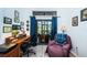 Home office with patio access and plenty of workspace at 9609 Brookdale Dr, New Port Richey, FL 34655