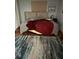 Spacious bedroom with large bed and area rug at 1050 Tamarac Dr, Holiday, FL 34690