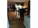 Dining area with barrel table and four chairs at 1050 Tamarac Dr, Holiday, FL 34690