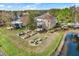 Backyard with firepit and raised garden beds at 10724 Burning Bush Ter, Land O Lakes, FL 34638