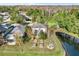 Backyard with raised garden beds and firepit at 10724 Burning Bush Ter, Land O Lakes, FL 34638