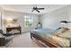 Bright bedroom featuring a comfortable bed and ample natural light at 10724 Burning Bush Ter, Land O Lakes, FL 34638
