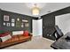 Bright home office features built-in shelving and a comfortable workspace at 10724 Burning Bush Ter, Land O Lakes, FL 34638