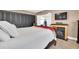 Bright bedroom with fireplace and built-in closet at 11617 Boynton Ln, New Port Richey, FL 34654