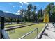Community bocce ball courts with yellow umbrellas at 11617 Boynton Ln, New Port Richey, FL 34654