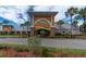 Community center with landscaped entryway at 11617 Boynton Ln, New Port Richey, FL 34654