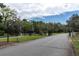 Gated entrance to the community with landscaping at 11617 Boynton Ln, New Port Richey, FL 34654