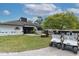 Summertree Golf Club building with golf carts at 11617 Boynton Ln, New Port Richey, FL 34654
