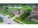 Aerial view showcasing the home's location in a desirable golf course community at 13455 Niti Dr, Hudson, FL 34669