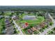 Aerial view of a house in a golf course community at 13455 Niti Dr, Hudson, FL 34669
