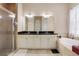 Elegant bathroom with double vanity and soaking tub at 13455 Niti Dr, Hudson, FL 34669