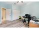 Spacious bedroom with double doors leading to the bathroom, and ample closet space at 13455 Niti Dr, Hudson, FL 34669