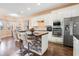 Modern kitchen with granite countertops and stainless steel appliances at 13455 Niti Dr, Hudson, FL 34669
