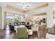 Open floor plan living room and kitchen with hardwood floors at 13455 Niti Dr, Hudson, FL 34669
