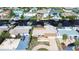 Aerial view of waterfront home and neighborhood at 13541 Stacey Dr, Hudson, FL 34667