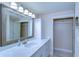 Bathroom boasts a large mirror and white cabinets at 13541 Stacey Dr, Hudson, FL 34667