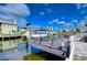Private boat dock with lift and canal access at 13541 Stacey Dr, Hudson, FL 34667