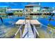 Private dock with steps leading to the water at 13541 Stacey Dr, Hudson, FL 34667
