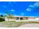 Single-story home with attached garage and landscaping at 13541 Stacey Dr, Hudson, FL 34667
