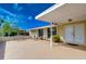 Inviting front exterior featuring a covered entryway and a spacious patio area at 13541 Stacey Dr, Hudson, FL 34667