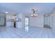 Modern kitchen with white cabinets, granite countertops, and stainless steel appliances at 13541 Stacey Dr, Hudson, FL 34667