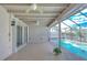 Relaxing pool area with covered patio and a view at 13541 Stacey Dr, Hudson, FL 34667