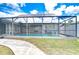 Screened-in swimming pool in backyard at 13541 Stacey Dr, Hudson, FL 34667