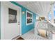 Private balcony with exterior door and railing at 13822 Judy Ave, Hudson, FL 34667