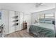 Guest bedroom with a queen-size bed and ample closet space at 13822 Judy Ave, Hudson, FL 34667