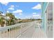 White deck overlooking waterfront with picnic table, offering scenic views at 13822 Judy Ave, Hudson, FL 34667