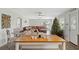 Open concept living area with leather sofa and a Christmas tree at 13822 Judy Ave, Hudson, FL 34667