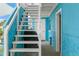 Exterior staircase leading to upper level and covered grill at 13822 Judy Ave, Hudson, FL 34667