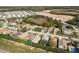 Aerial view of residential neighborhood street at 14120 Whitecap Ave, Hudson, FL 34667