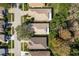 Aerial view of a residential neighborhood with houses and landscaping at 14120 Whitecap Ave, Hudson, FL 34667