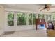 Florida room with ample natural light and tiled floor at 14120 Whitecap Ave, Hudson, FL 34667