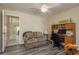 Spacious home office with a comfortable couch and work area at 14120 Whitecap Ave, Hudson, FL 34667