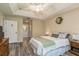 Main bedroom with access to bathroom and large window at 14120 Whitecap Ave, Hudson, FL 34667
